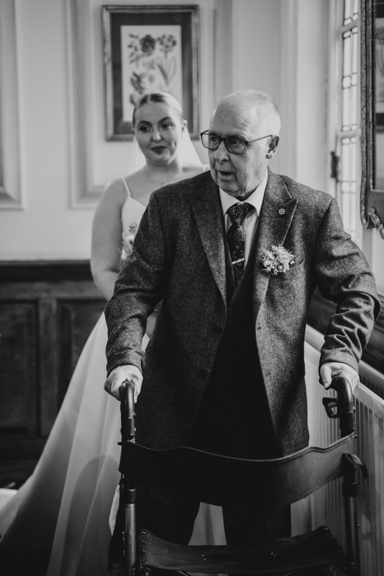 Bride walking behind her Grandparent down the aisle.