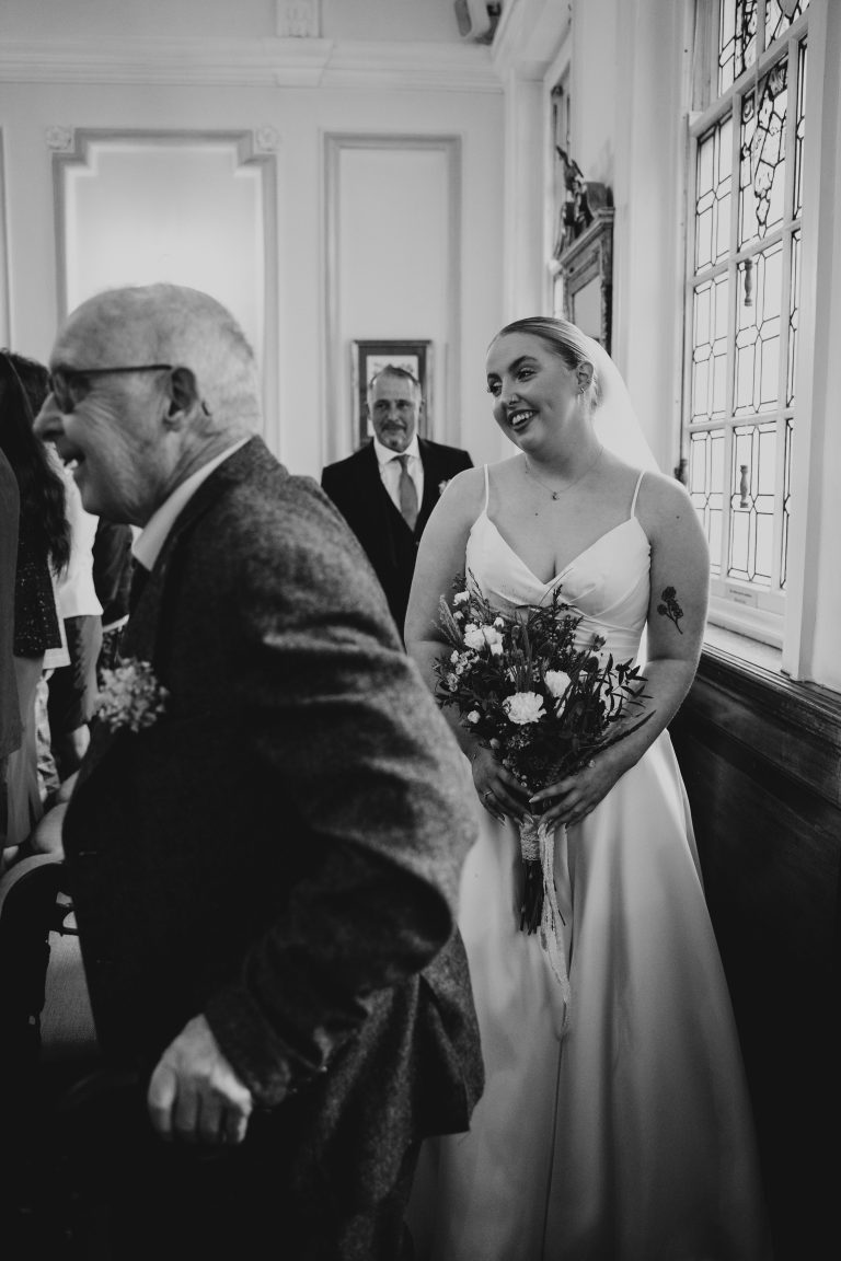 Bride walking behind her Grandparent down the aisle.